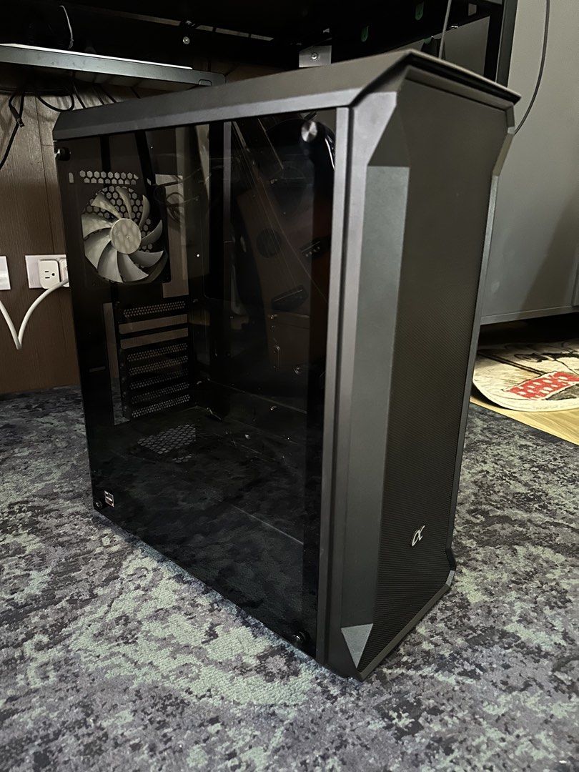 Alpha ATX Mid Tower PC Case with Tempered Glass Side Panel (Category: Desktops) located in Makati City. Submitted by smolpapi (Listing ID 1464135340, Image 1). Description: - Alpha ATX Mid-Tower PC Case - Tempered glass side panel to showcase your build - Includes 2 pre-installed fans - Spacious interior for easy component installation - Front mesh panel for excellent airflow - Ideal for new PC builds or upgrades.