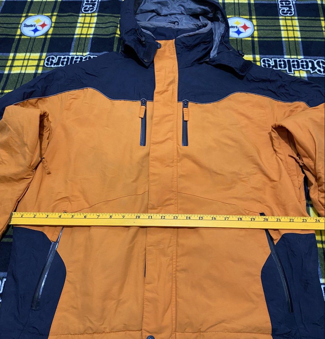 ALPHINE DESIGN, Outerwear jacket (Heavy cloth) (Category: Coats, Jackets and Outerwear) located in Cavite. Submitted by jc_thrift95 (Listing ID 1464052173, Image 3). Description: - an orange and black winter jacket featuring contrasting dark charcoal panels and vertical zippered chest pockets. - Made in Vietnam - Color rate 8/10 - See pictures details for dimes..