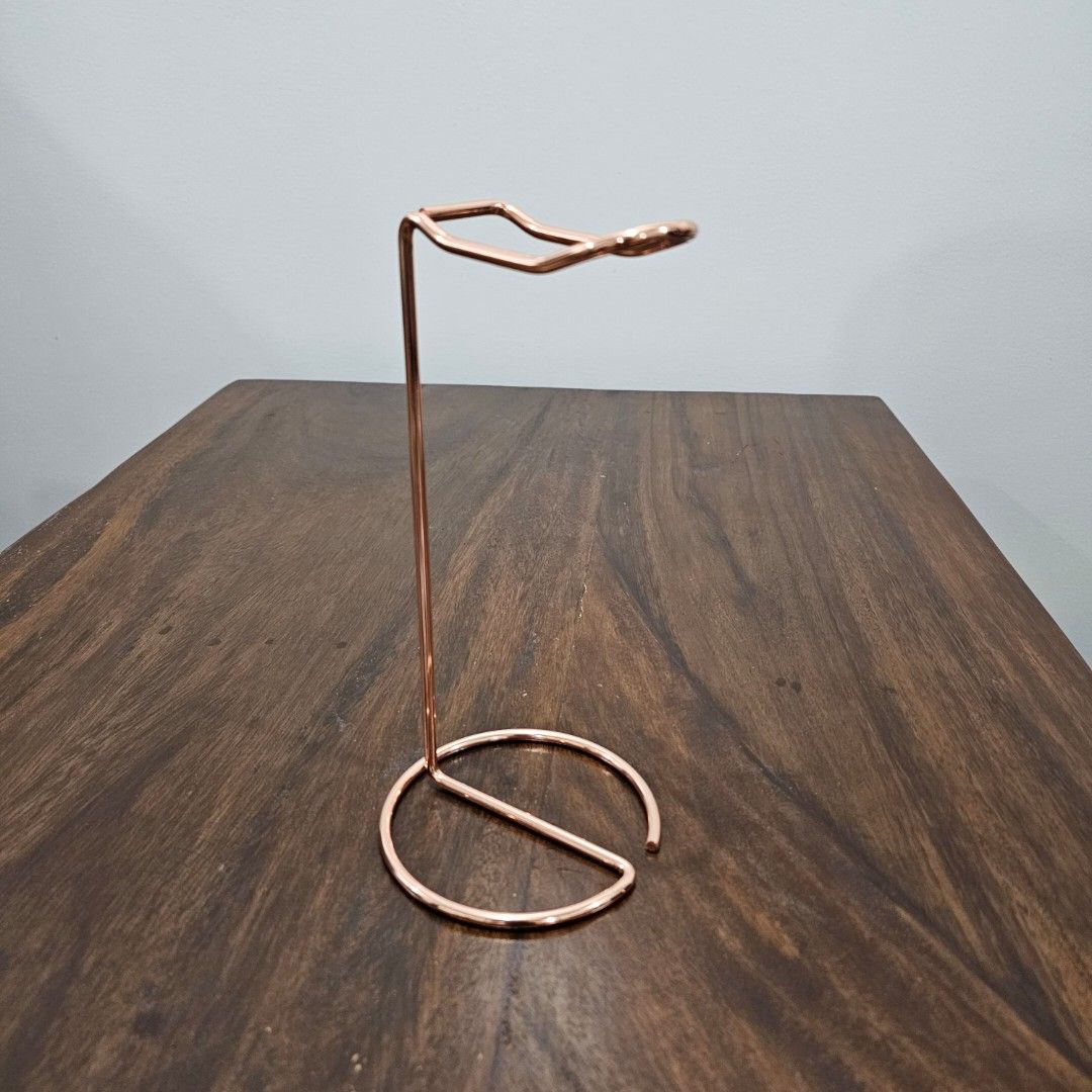 Aluminum Headset Stand (Category: Hooks & Hangers) located in Quezon City. Submitted by reply_1982 (Listing ID 1463970960, Image 1). Description: - Unique aluminum wire hook - Geometric shape on one end, circular holder on the other - Ideal for hanging headet - Adds a modern, minimalist decorative touch - Great for organization and display.