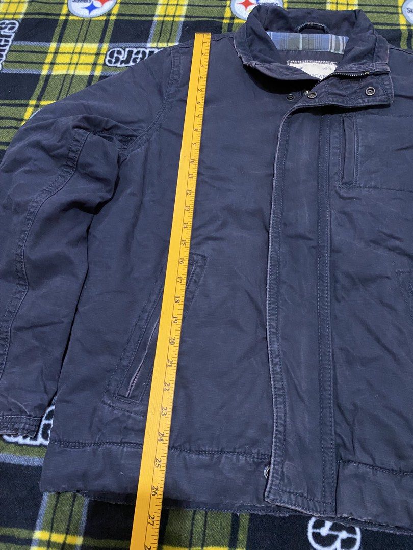 AMERICAN EAGLE,Full zip jacket (Heavy cloth) (Category: Coats, Jackets and Outerwear) located in Cavite. Submitted by jc_thrift95 (Listing ID 1464051012, Image 2). Description: - a dark blue American Eagle Outfitters canvas field jacket featuring a distinctive stand-up collar and zippered front pockets. - Made in India - Color rate 8/10 - See pictures details for dimes..