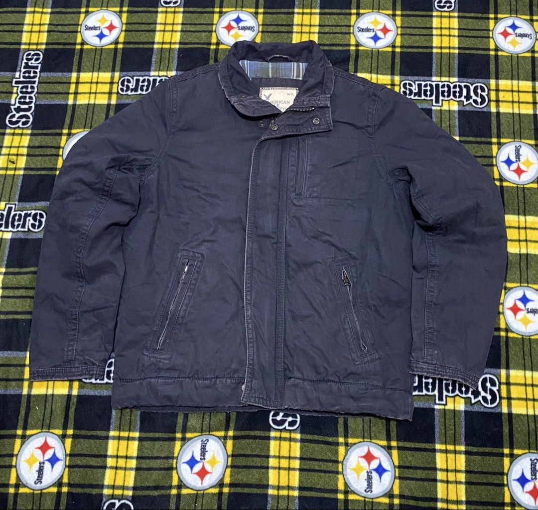 AMERICAN EAGLE,Full zip jacket (Heavy cloth) (Category: Coats, Jackets and Outerwear) located in Cavite. Submitted by jc_thrift95 (Listing ID 1464051012, Image 1). Description: - a dark blue American Eagle Outfitters canvas field jacket featuring a distinctive stand-up collar and zippered front pockets. - Made in India - Color rate 8/10 - See pictures details for dimes..