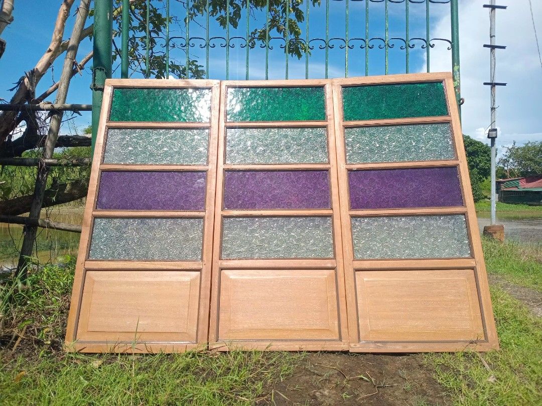 Ampalaya Stain Glass Windows (Category: Vintage Collectibles) located in San Fernando. Submitted by josephtanjuaquio (Listing ID 1463985112, Image 1). Description: Ampalaya Stain Glass Windows 22.5in x 50.5in 4 panels 23.5 x 50.5in 4 panels Total of 8 panels All exellent condition Intact frames Wood stain finish (Restored) DM/PM for interested 📩 Please like and follow our Facebook page "Kalumaan Antiques Shop Atbp." We ship nationwide God Blesse