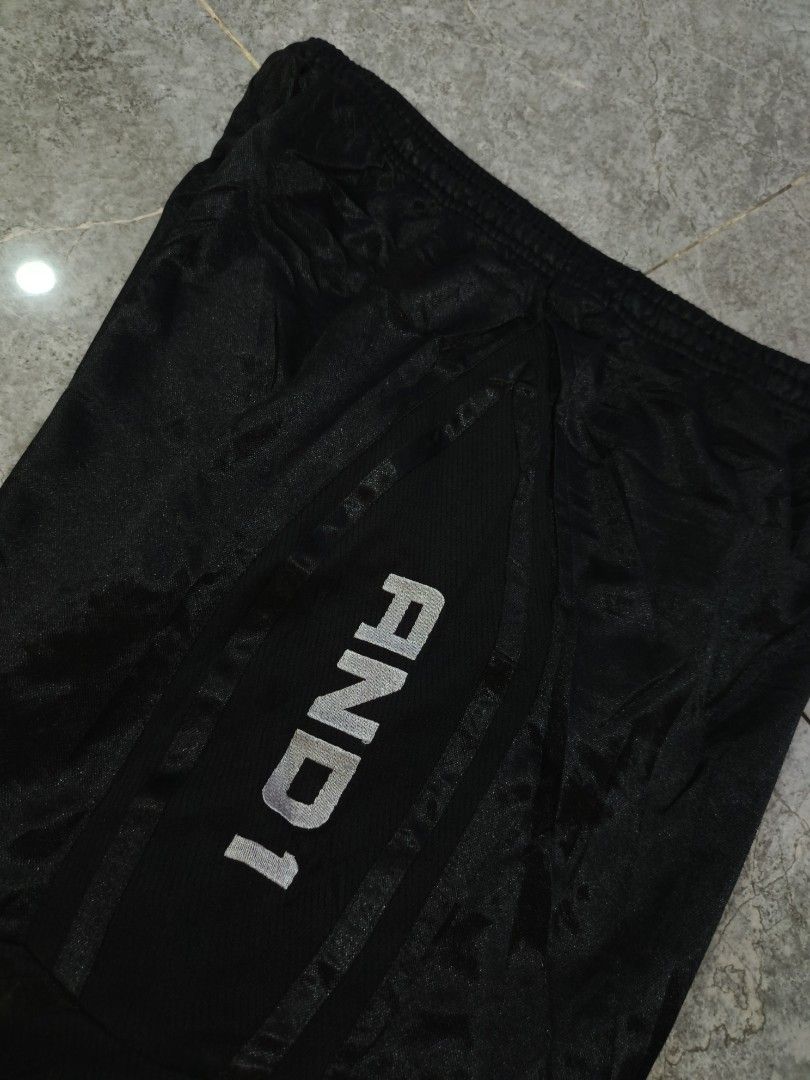 AND1 Black Basketball Shorts (Category: Shorts) located in Talisay. Submitted by rubiobryle20102 (Listing ID 1464042549, Image 3). Description: - Brand: AND1 - Color: Black - Size: XL - Features: AND1 logo on side, elastic waistband with drawstring - Material: Comfortable and breathable - Ideal for: Basketball, sports, or casual wear 480 Free shipping📥.
