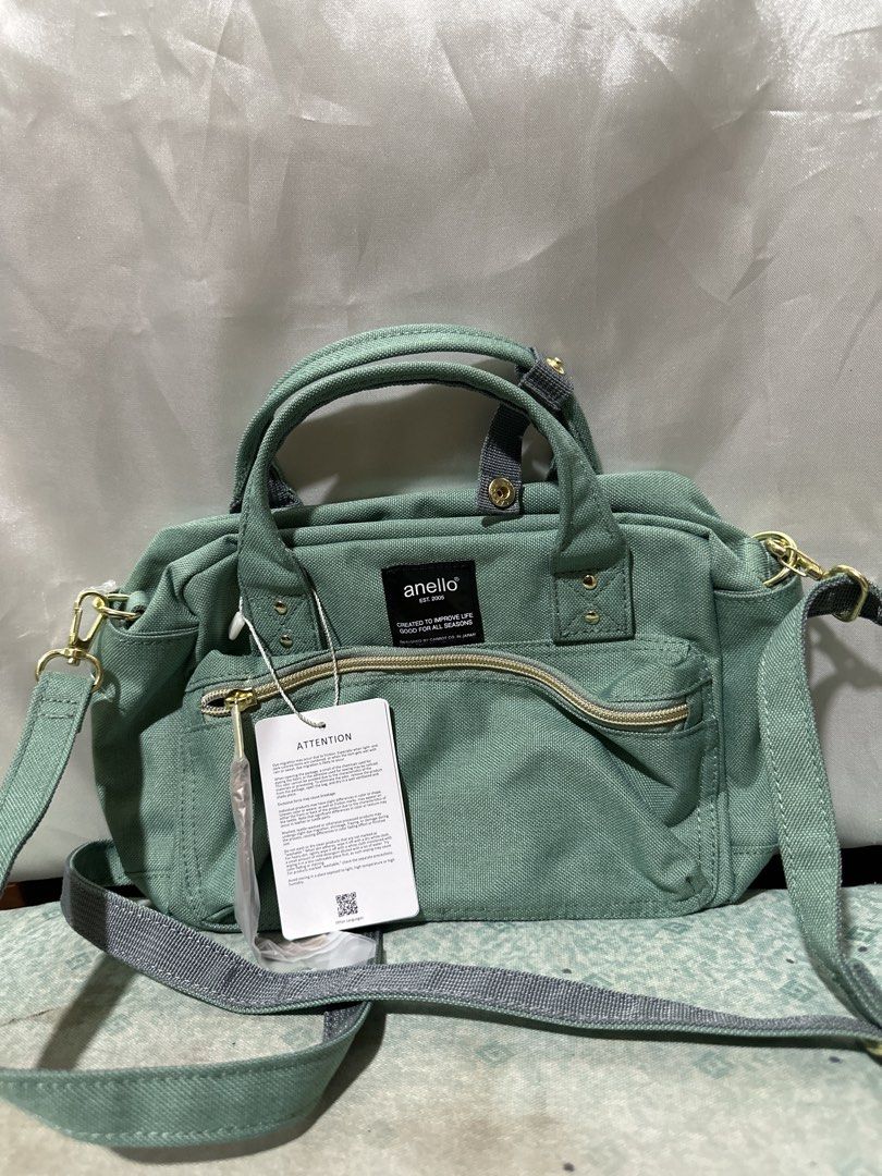 Anello Bag - Green (Category: Shoulder Bags) located in Balanga. Submitted by jk2025. (Listing ID 1463954981, Image 1). Description: - Cute green Anello bag - Features top handles and a detachable crossbody strap - Multiple pockets for excellent organization - Brand new with original tag still attached - Ideal for everyday use and travel.