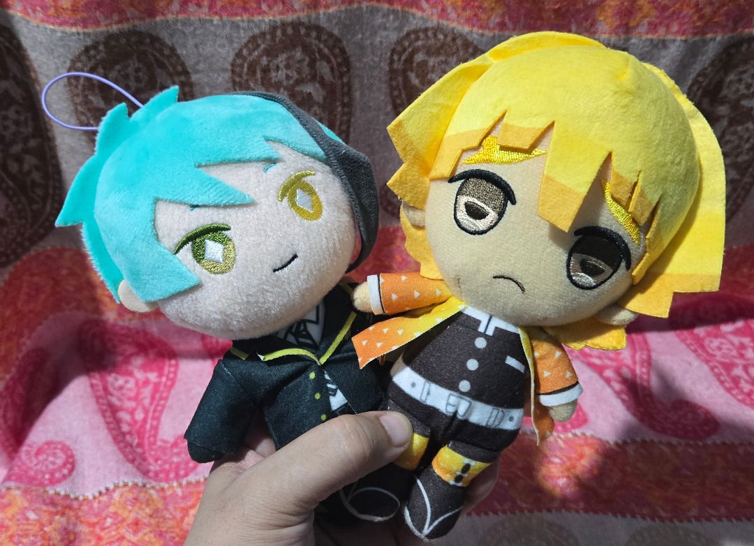 [Anime Merch] Assorted Plush Toys (Category: Plushies & Soft Toys) located in Quezon City. Submitted by animeblmerchs (Listing ID 1464070091, Image 1). Description: Assorted Plush Toys: ALL are PREOWNED. Please manage your expectations. Approximately 10-12 cm tall Available: [1] Demon Slayer Kimetsu no Yaiba - Zenitsu Agatsuma Bandai Plush Doll [2] Twisted Wonderland - Jade Leech Plush Doll [3] Detective Conan - Muga Iori Plush Doll Sold as: [1/2