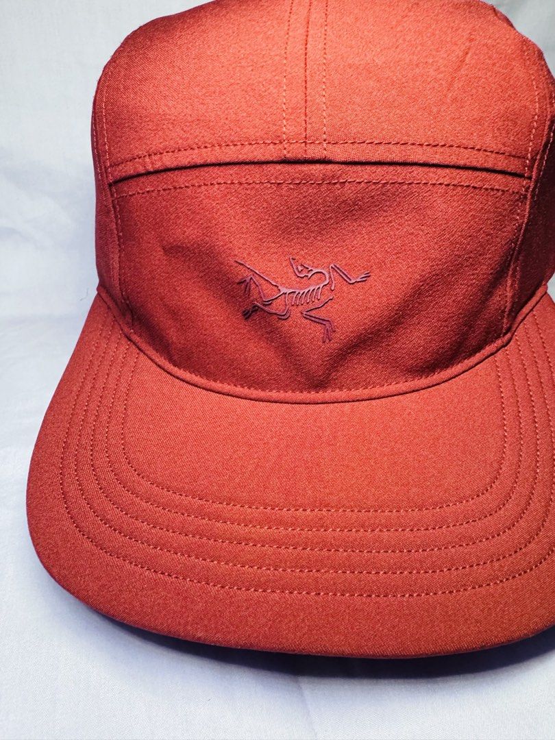 Arc'teryx 5 Panel Cap Red (Category: Caps & Hats) located in Roxas City. Submitted by patsquarephantz (Listing ID 1463991001, Image 2). Description: - Red Arc'teryx 5-panel cap - Iconic bird logo on the front - Adjustable strap at the back for a custom fit - Versatile for everyday wear or outdoor activities - Simple and stylish design.