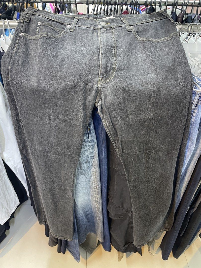 Armani Jeans (Category: Jeans) located in Lucena. Submitted by riyizthriftz (Listing ID 1464126131, Image 2). Description: - Brand: Armani Exchange - Wash: Dark Denim - Fit: Straight Leg - Size: 38 Waist - Closure: Button Fly - Pockets: Classic Five-Pocket Styling - Condition: Good - Ideal for: Casual Wear.