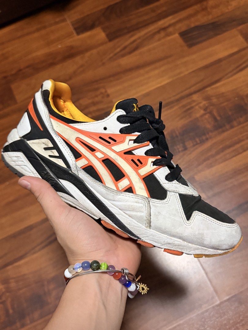 Asics Gel-Kayano (Category: Sneakers) located in Manila. Submitted by swiftgem.eeb06e (Listing ID 1464011371, Image 2). Description: - Authentic Asics Gel-Kayano sneakers - Size: 8.5 - Condition: 8.5/10 - Needs cleaning - Colorway: White, Orange, and Black - Classic running shoe design - Shows some signs of wear on uppers and soles - Still has plenty of life left for running or casual wear - Comes with the original box.