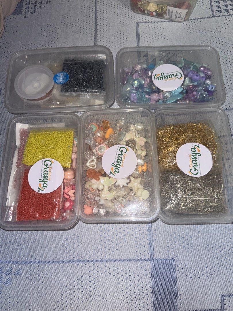 Assorted Beads, Charms, and Jewelry Making Tools (Category: Craft Supplies & Tools) located in Cavite. Submitted by yanyax (Listing ID 1464107727, Image 2). Description: - Large collection of beads in various colors and shapes - Includes alphabet beads and charms - Comes with essential findings: jump rings and clasps - Jewelry pliers and stringing wire included - Ideal for all your DIY jewelry and crafting projects.