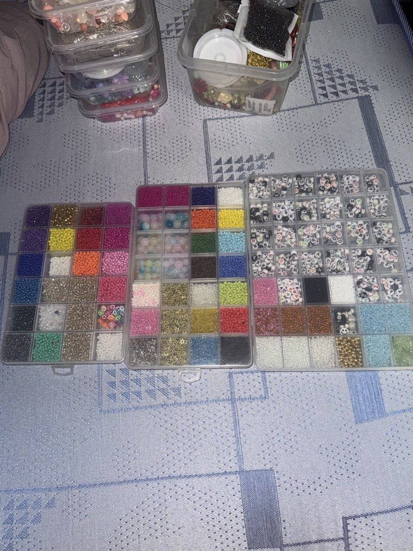 Assorted Beads, Charms, and Jewelry Making Tools (Category: Craft Supplies & Tools) located in Cavite. Submitted by yanyax (Listing ID 1464107727, Image 3). Description: - Large collection of beads in various colors and shapes - Includes alphabet beads and charms - Comes with essential findings: jump rings and clasps - Jewelry pliers and stringing wire included - Ideal for all your DIY jewelry and crafting projects.