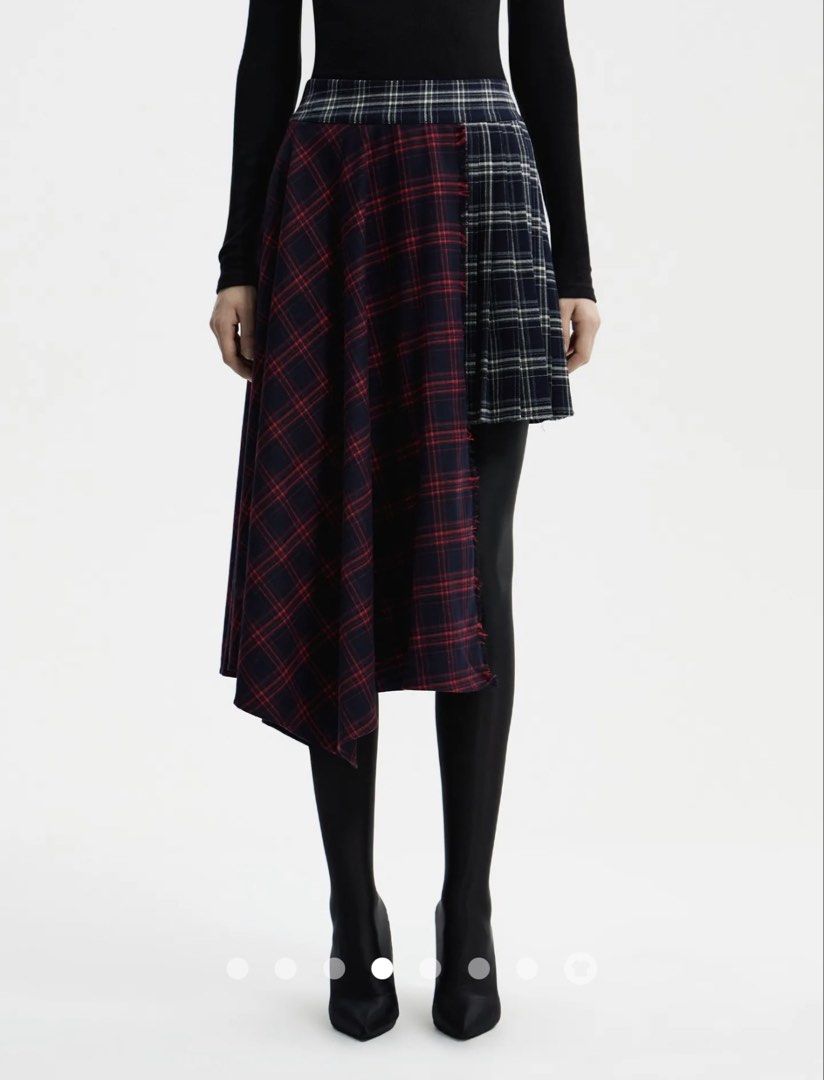 Asymmetric A-line Skirt (Category: Skirts) located in Cainta. Submitted by abegailyap14 (Listing ID 1464076512, Image 3). Description: High-waisted A-line skirt in plaid with colour block, patchwork, and pleated design details. Short length with an asymmetrical hem for a relaxed fit. (4pcs Available) 2 Small 2 Medium.