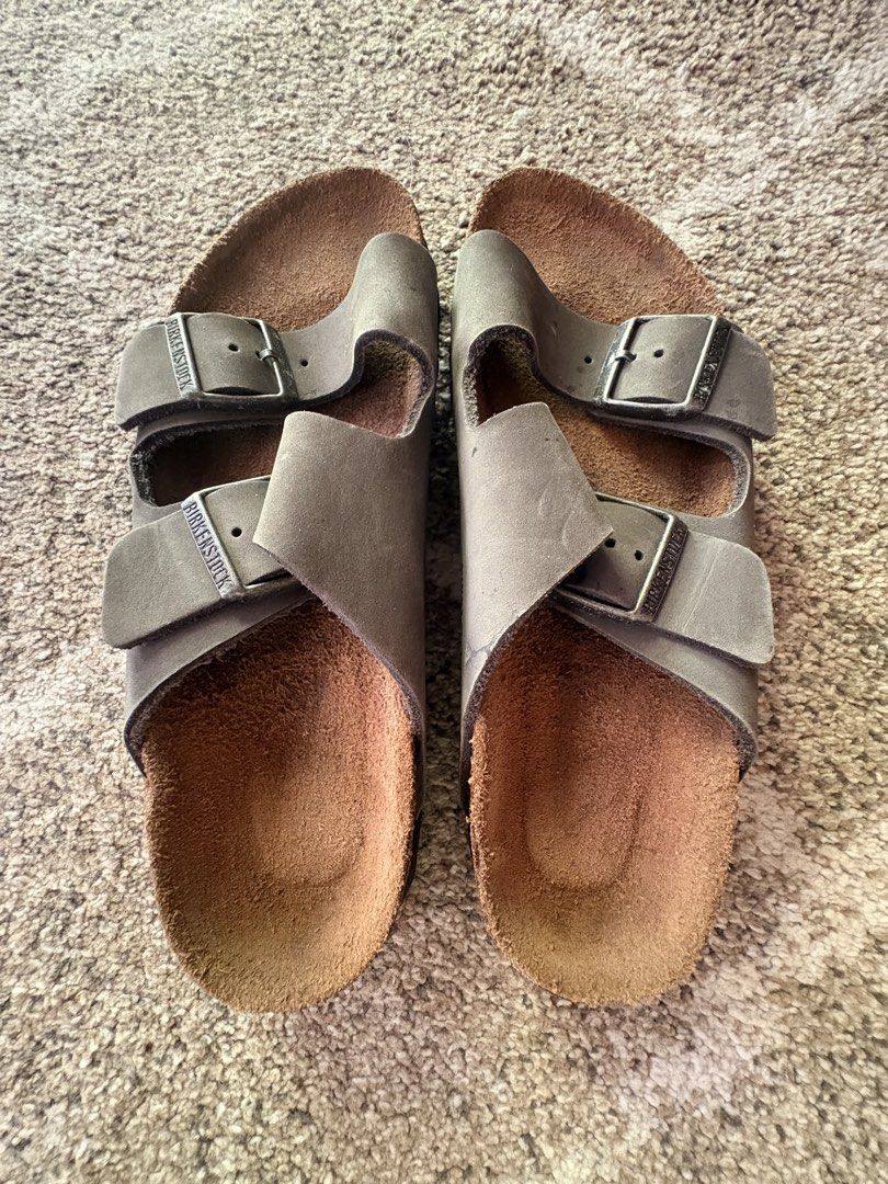 Auth Preloved Birkenstock Arizona (Category: Slippers and slides) located in Paranaque City. Submitted by silentstone.dolphin (Listing ID 1463976617, Image 2). Description: Oiled Leather.. Color Gray Strap.. Soft Footbed.. Brass Buckle.. Clean&Ready to Wear✅ Size 39N.. Super Nice in Actual😍.