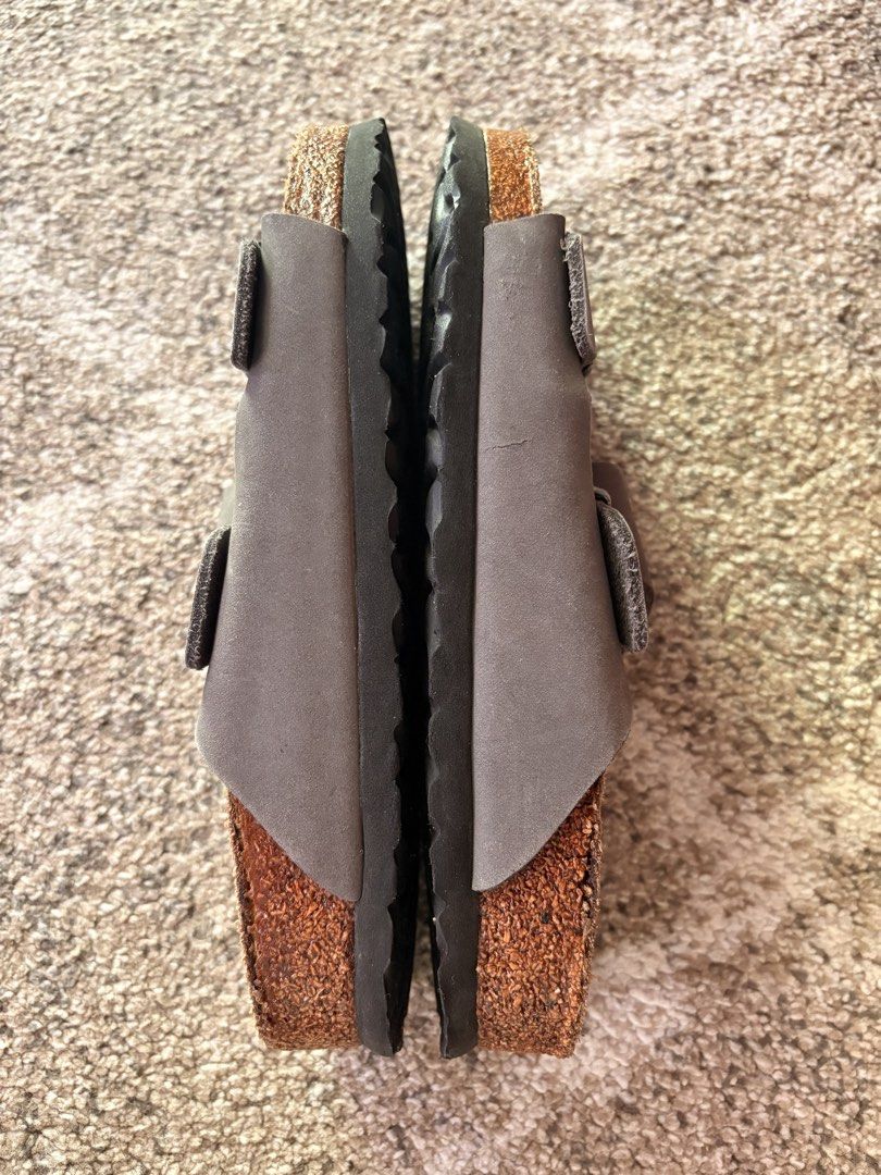 Auth Preloved Birkenstock Arizona (Category: Slippers and slides) located in Paranaque City. Submitted by silentstone.dolphin (Listing ID 1463976617, Image 3). Description: Oiled Leather.. Color Gray Strap.. Soft Footbed.. Brass Buckle.. Clean&Ready to Wear✅ Size 39N.. Super Nice in Actual😍.