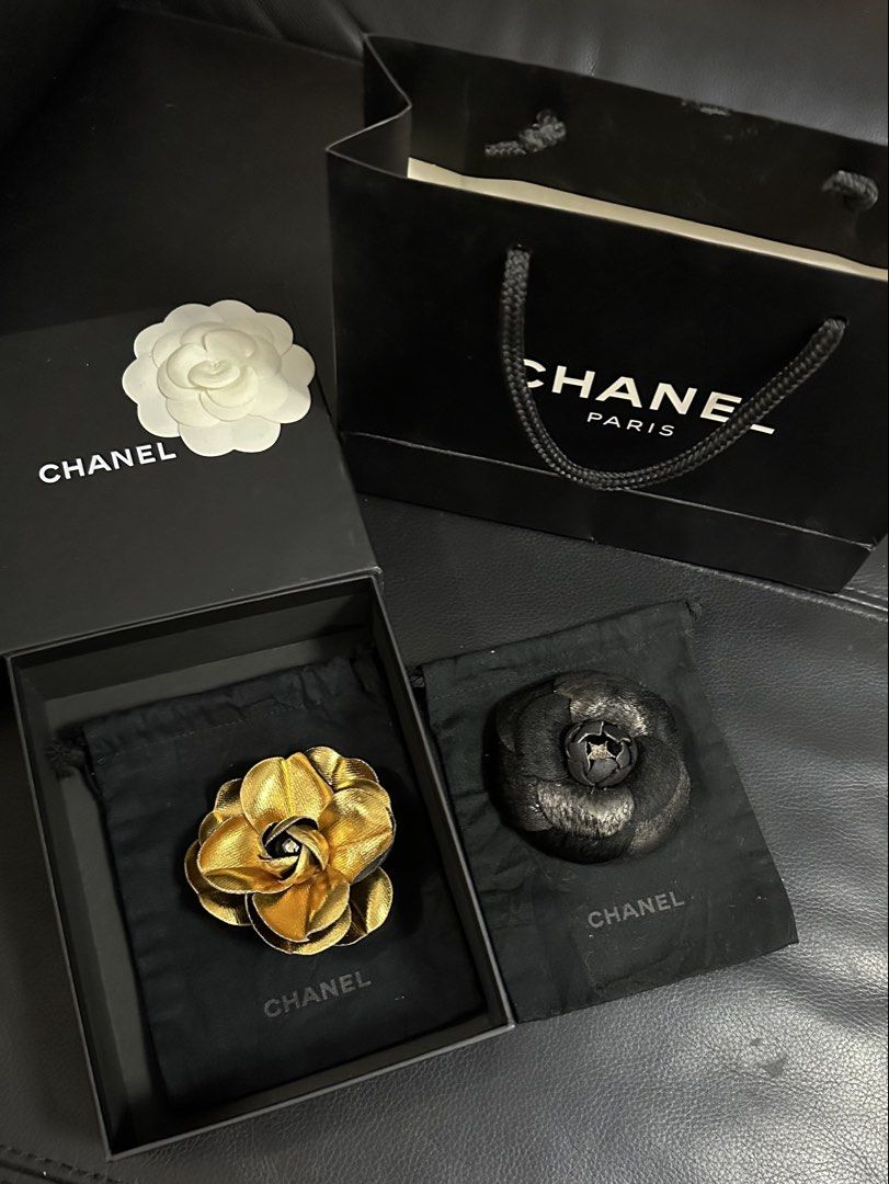 Authentic Chanel Camellia Pin Brooch (Category: Luxury Accessories) located in Las Pinas. Submitted by marshmallowmax (Listing ID 1464022361, Image 1). Description: Guaranteed Authentic! 2 for 15k only If individual price: Gold 9k (with box & dustbag) Black 8k (with paperbag & dustbag).