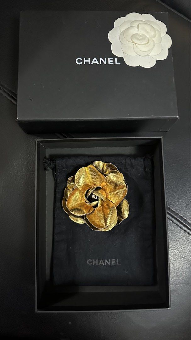 Authentic Chanel Camellia Pin Brooch (Category: Luxury Accessories) located in Las Pinas. Submitted by marshmallowmax (Listing ID 1464022361, Image 2). Description: Guaranteed Authentic! 2 for 15k only If individual price: Gold 9k (with box & dustbag) Black 8k (with paperbag & dustbag).