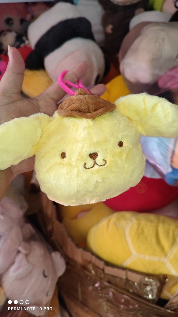 Authentic L.O.L. Surprise x Hello Kitty Reversible Plush Keychain (Category: Plushies & Soft Toys) located in Manila. Submitted by vasthawk.51c978 (Listing ID 1463939696, Image 2). Description: Product Description Super cute, authentic L.O.L. Surprise! Loves Hello Kitty and Friends Reversible Plush Keychain!This is not just a standard plush clip—it is a 2-in-1 mystery item. The fuzzy Hello Kitty face pom flips inside out to reveal a surprise Sanr