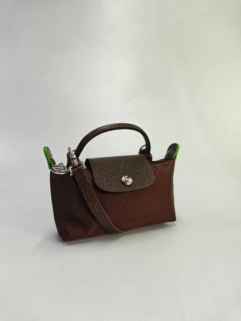 Authentic Longchamp Mini Pouch with Sling (Category: Announcements) located in Quezon City. Submitted by hollowwillow (Listing ID 1464016854, Image 2). Description: .