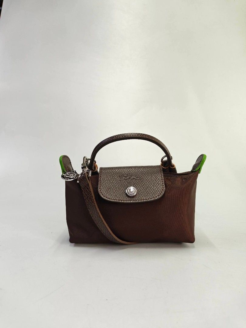 Authentic Longchamp Mini Pouch with Sling (Category: Announcements) located in Quezon City. Submitted by hollowwillow (Listing ID 1464016854, Image 1). Description: .