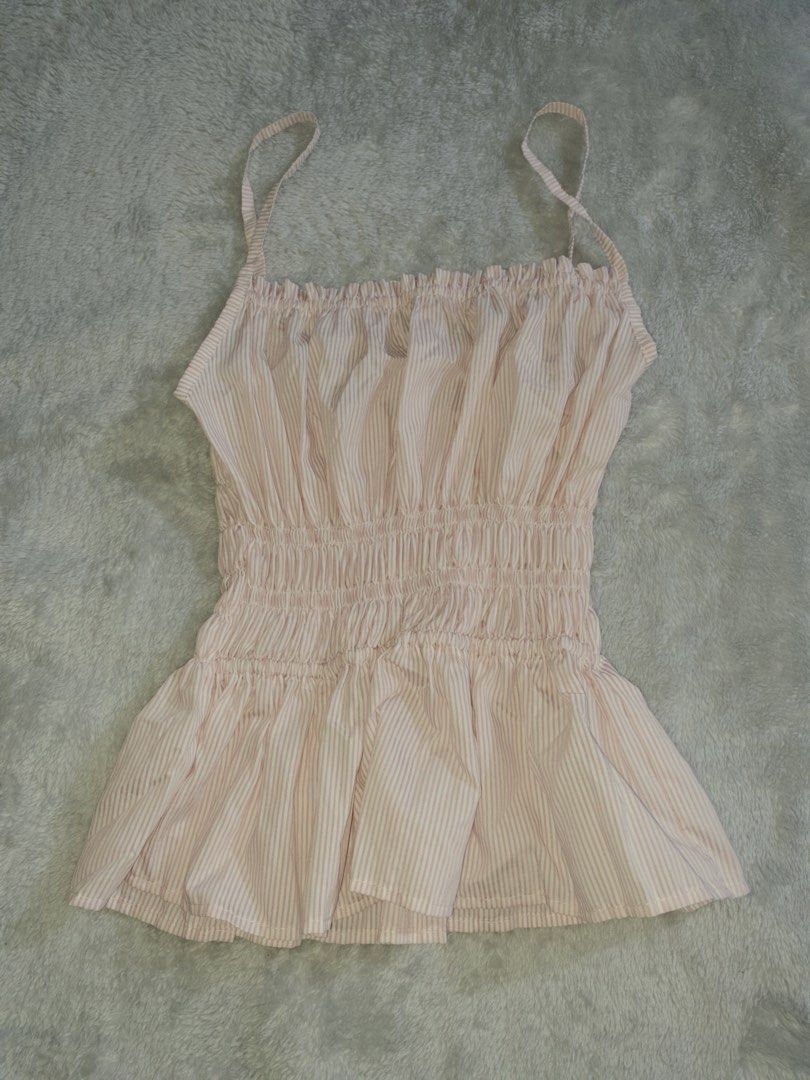 baby pink doll top (Category: Sleeveless) located in Manila. Submitted by thelittlearchiveofelle (Listing ID 1464039129, Image 1). Description: worn once, good as new! in perfect shade pink, looks perfect on my body. rfs - decluttering.