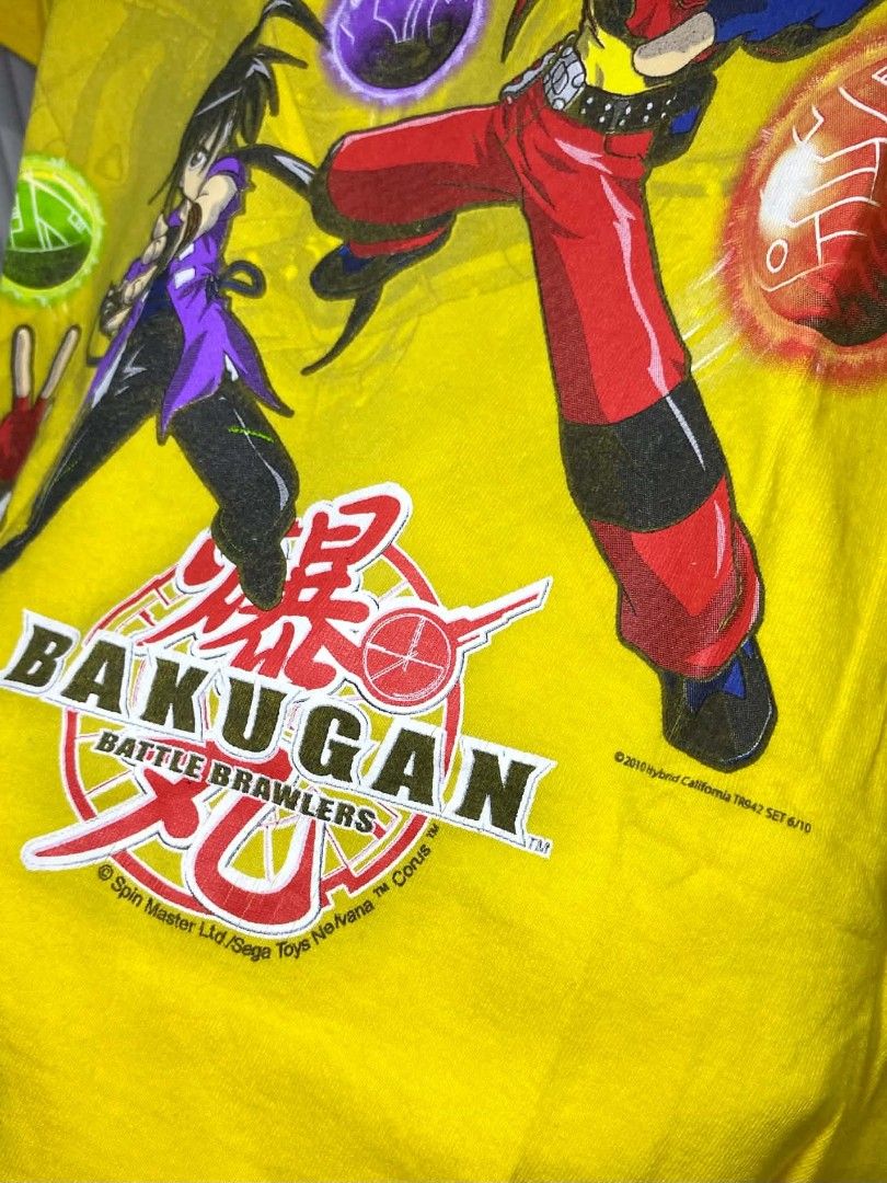 Bakugan Tee (2010) (Category: Activewear) located in Tarlac. Submitted by dinnuh4e (Listing ID 1464109017, Image 2). Description: Bakugan (2010) W 19 L 27 cut white tag.