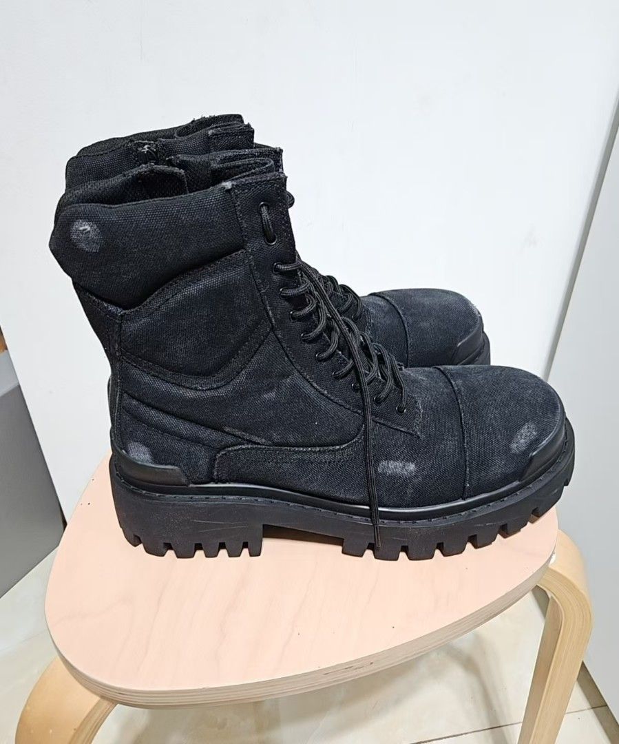 Balenciaga Strike Boots (Category: Boots) located in Butuan. Submitted by mrshi7000 (Listing ID 1464005420, Image 3). Description: - Balenciaga Strike Boots - Color: Black - Material: Canvas - Size: 42 - Features: Chunky platform sole, lace-up front, side zip - Includes: Original box.