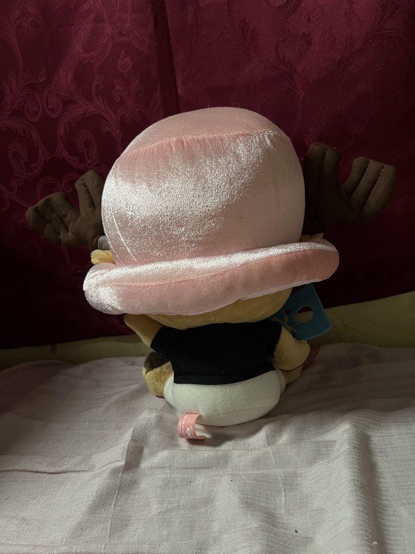 Banpresto One Piece Chopper Plush Toy (Category: Plushies & Soft Toys) located in Bulacan. Submitted by haven_plushie_dolls.888 (Listing ID 1464077535, Image 2). Description: - Authentic Banpresto One Piece Chopper plush. - Features Chopper in his classic pink hat and star shirt. - Comes with a blue flag accessory. - A must-have for any One Piece or anime fan's collection..