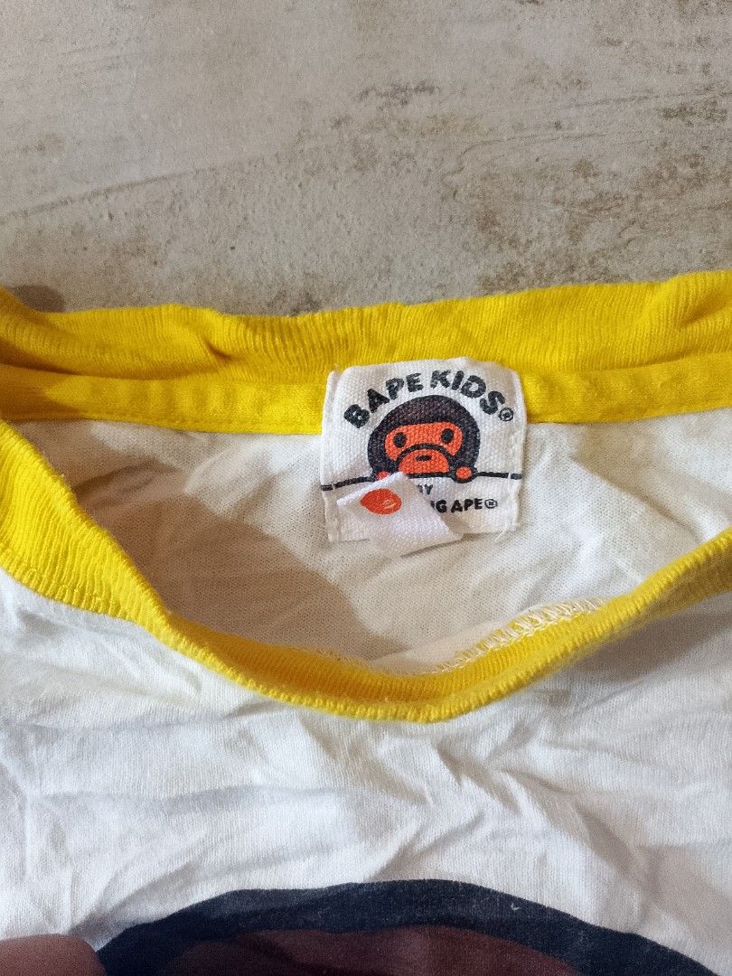 BAPE KIDS L/S Tee (size 140) (Category: Babies & Kids Fashion) located in Surigao. Submitted by luffytrift (Listing ID 1463991853, Image 3). Description: BAPE KIDS L/S Tee (size 140) Dimension: L 20 x W 16 Excellent Condition Color rate: 9.5 Issue: Last picture.
