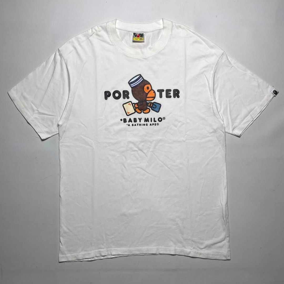 BAPE X PORTER TEE (Category: Shirts) located in San Fernando. Submitted by upwear.ph (Listing ID 1464080699, Image 1). Description: BAPE X PORTER TEE CONDITION: EXCELLENT SIZE : XXL ON TAG FIT TO LARGE DIMENSION: W22 x L30 ISSUE: NONE .