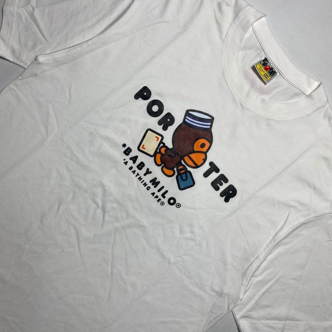 BAPE X PORTER TEE (Category: Shirts) located in San Fernando. Submitted by upwear.ph (Listing ID 1464080699, Image 2). Description: BAPE X PORTER TEE CONDITION: EXCELLENT SIZE : XXL ON TAG FIT TO LARGE DIMENSION: W22 x L30 ISSUE: NONE .