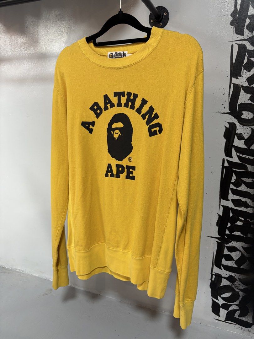 Bape Yellow Crewneck College Logo (Category: Activewear) located in Manila. Submitted by bravestone14 (Listing ID 1464087925, Image 1). Description: Bape Yellow Crewneck College Logo 22x28 No issue excellent condition 2800+sf Thankyou and appreciate✨.
