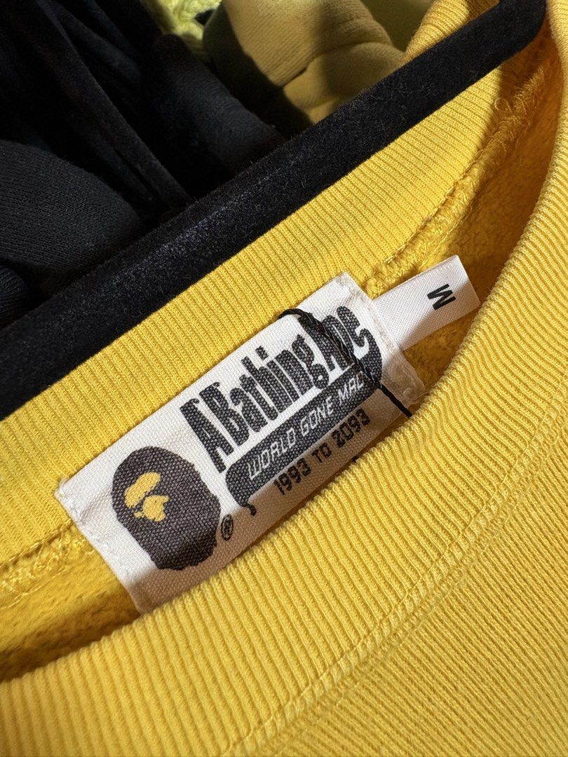 Bape Yellow Crewneck College Logo (Category: Activewear) located in Manila. Submitted by bravestone14 (Listing ID 1464087925, Image 2). Description: Bape Yellow Crewneck College Logo 22x28 No issue excellent condition 2800+sf Thankyou and appreciate✨.