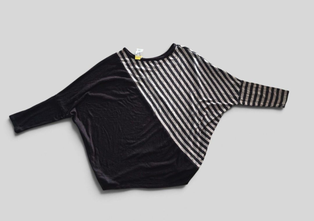 batwing blouse Black & Striped Dolman Sleeve Top (Category: Blouses) located in Taguig. Submitted by deyerreC2020 (Listing ID 1464000444, Image 3). Description: with tag new blouse XL black top with diagonal stripes and dolman sleeves. New with tag from Goodwill. Perfect for casual outfits. knitted fabric stretchy up to 3 xl MOP: gcash/cash.