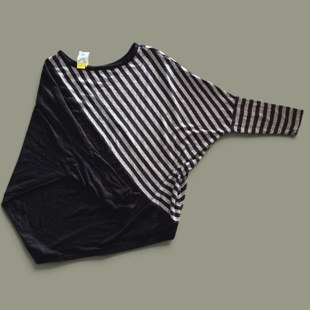 batwing blouse Black & Striped Dolman Sleeve Top (Category: Blouses) located in Taguig. Submitted by deyerreC2020 (Listing ID 1464000444, Image 1). Description: with tag new blouse XL black top with diagonal stripes and dolman sleeves. New with tag from Goodwill. Perfect for casual outfits. knitted fabric stretchy up to 3 xl MOP: gcash/cash.