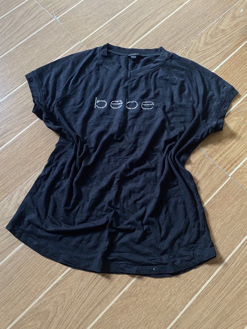 Bebe top (Category: Shirts) located in Paete. Submitted by fat.archives (Listing ID 1464079844, Image 1). Description: Dimes Bust 17 Length 21 +sf.