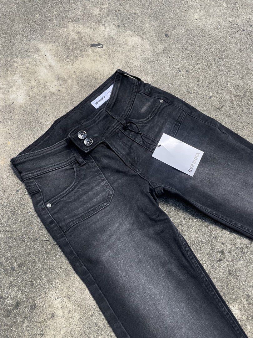 Bershka Black Flare Jeans (Category: Jeans) located in Pasay City. Submitted by qptingz (Listing ID 1463989646, Image 2). Description: - Bershka black flare jeans - Washed-out look - Button and zip front closure - Two button details on waistband - Front and back pockets - Flare leg style.