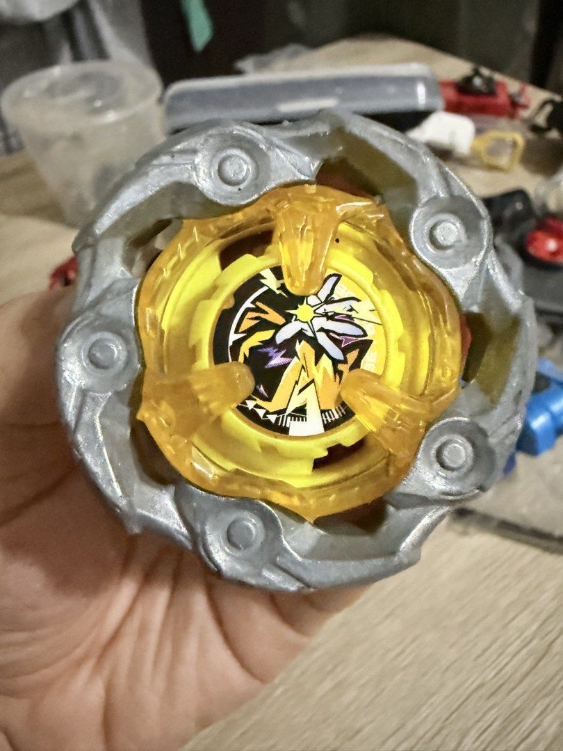 Beyblade quitting sale (Category: Action & Battle Toys) located in Manila. Submitted by cara_tinioco (Listing ID 1463955136, Image 3). Description: quitting sale ‼️ unsealed/used (all with bankee boxes): UX-08 Silver Wolf 3-80 Free Ball BX-23 Phoenix Wing 9-60 Gear Flat UX-03 Wizard Rod 5-70 Disc Ball BX-31 Dran Dagger (Orange) 4-70 Point BX-01 Dran Sword 3-60 Flat BX-35-02 Whale Wave 4-70 High Needle UX-11 Impact Drake 9-60 Low Rush UX-10 Tyrann