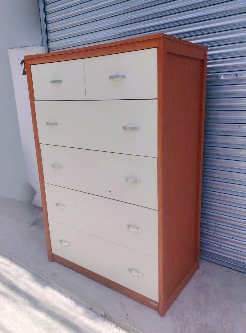 Big Chest Drawer (Category: Shelves, Cabinets & Racks) located in Taguig. Submitted by sydney08.owl (Listing ID 1463989919, Image 2). Description: BIG CHEST DRAWER Size: L-38 W-21 H-56 inches Price: ₱8,500 + delivery fee Description: -Made of wood & laminated plyboard -Color "White & Tan" -Roller guide drawers -Minimal scratches.