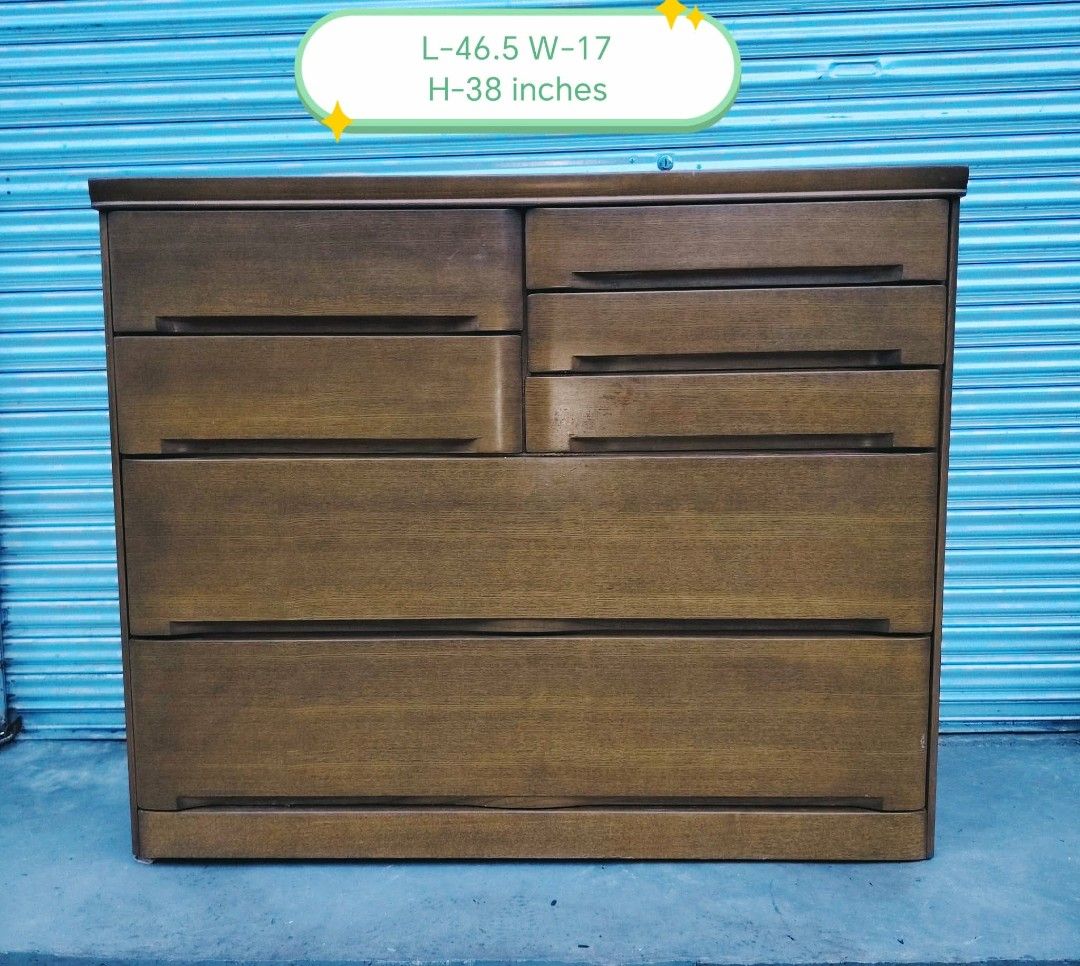 Big Chest Drawer (Category: Other Home Furniture) located in Taguig. Submitted by sydney08.owl (Listing ID 1463992261, Image 1). Description: 🤎 Japanese Wooden Chest of Drawers 🤎 Napakabigat at solid talaga! 💪✨ Perfect for storing clothes, linens, and other essentials. Spacious and sturdy—pangmatagalan! 😍 📏 Size: L-46.5" × W-17" × H-38" 📩 Php9000 plus delivery fee 📍 Dafu’s Furniture Shop 🛵 Delivery available via Lalamove — buyer’s expense