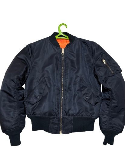 Black Alpha Industries MA-1 Bomber Jacket Orange Reversible (Category: Coats, Jackets and Outerwear) located in Cebu City. Submitted by stevejacy (Listing ID 1463984971, Image 1). Description: - Black Alpha Industries MA-1 bomber jacket - Reversible design: Black Nylon exterior, bright orange interior - Zipper closure - Utility pocket on the sleeve - Ribbed cuffs, collar, and hem - Versatile for everyday wear; looks great styled open or zipped - 