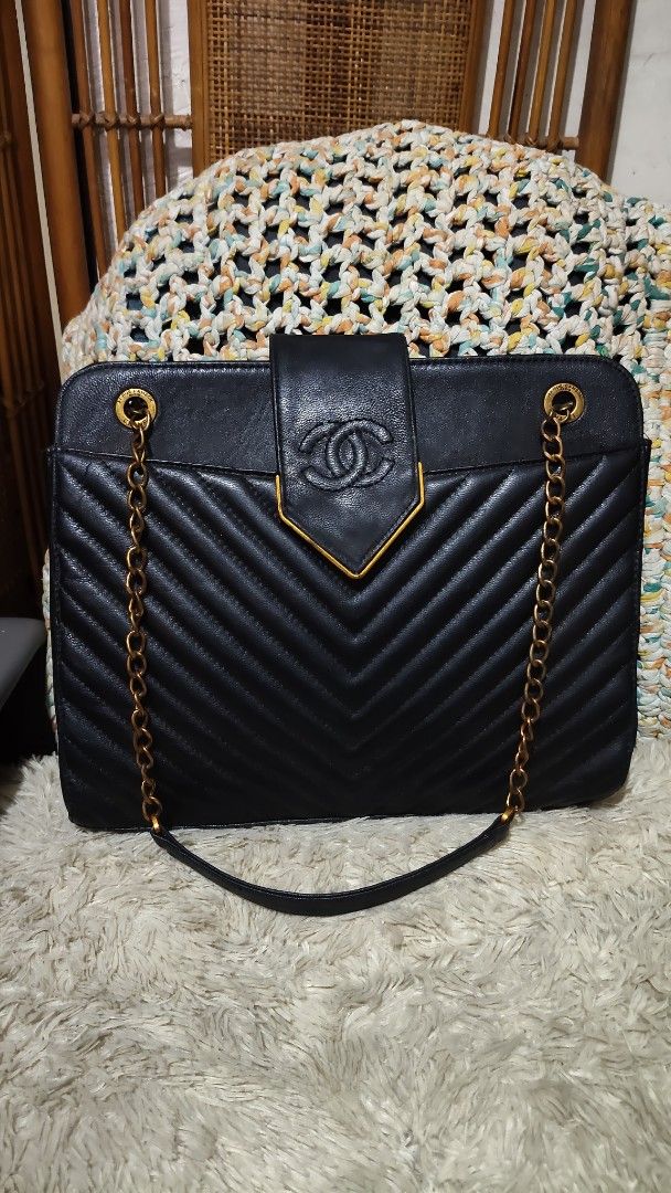 Black Chevron Leather Chain Shoulder Bag (Category: Tote Bags) located in Cebu City. Submitted by lumaynojes00490 (Listing ID 1463961389, Image 3). Description: - Classic black shoulder bag - Elegant chevron pattern on leather - Stylish gold chain strap - Secure flap closure with iconic CC logo detail - Vintage-inspired aesthetic - Ideal size for daily essentials - Highly versatile for any outfit.