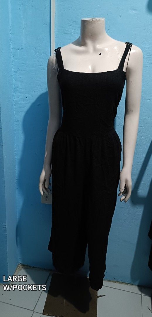 Black Jumpsuit with Adjustable Straps and Pockets - Size Large (Category: Jumpsuits) located in Quezon City. Submitted by davidclothing (Listing ID 1464063284, Image 1). Description: - Chic black jumpsuit - Adjustable straps - Flattering square neckline - Fitted bodice for a defined silhouette - Wide, flowy legs for comfort and style - Convenient side pockets - Size: Large - Versatile: Great for casual outings or dressing up for events.