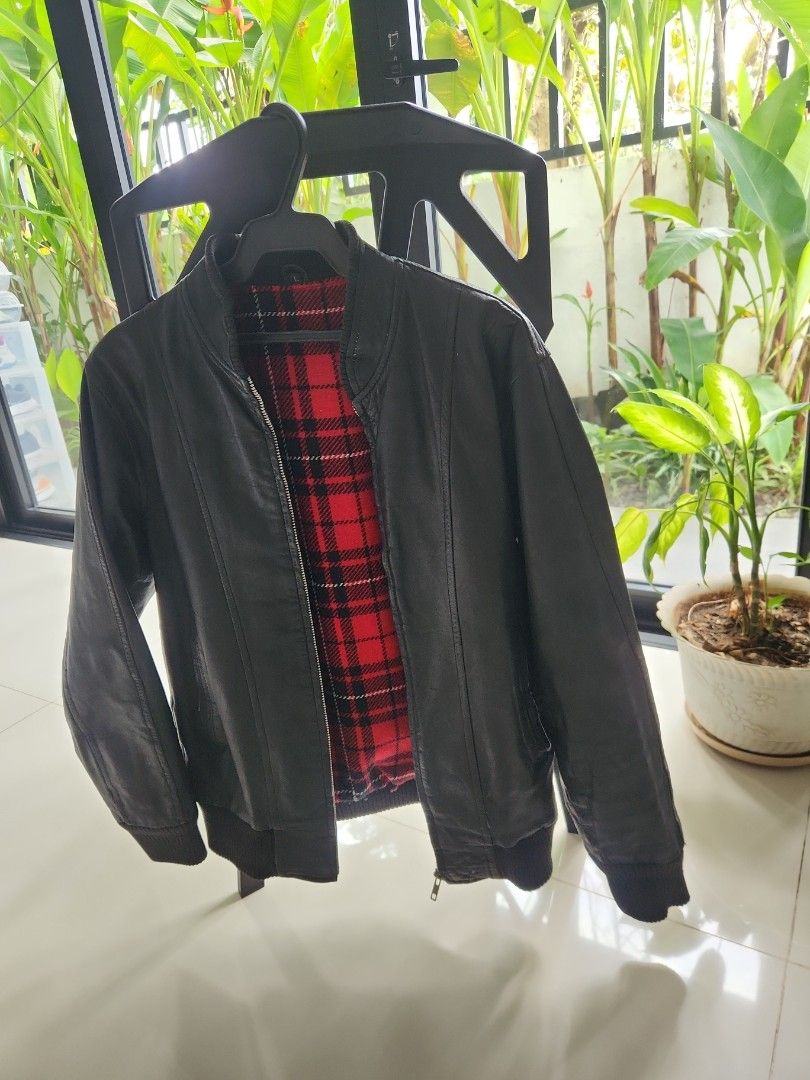 Genuine Leather Jacket (Category: Coats, Jackets and Outerwear) located in San Juan City. Submitted by rdlr5050 (Listing ID 1463967802, Image 1). Description: - genuine leather - Classic design - Warm red plaid lining - Ribbed cuffs and hem for a snug fit - bought in Japan and used lightly in one of our trips - kept in the closet for a while RFS: need more closet space as we are renovating. dont want to maintain leather jackets. selling almost al