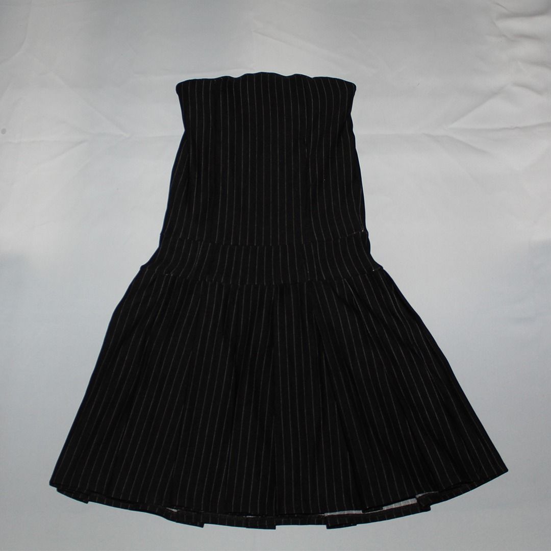 Black Pinstripe Strapless Dress (Category: Dresses) located in Tanauan. Submitted by arlene_panganiban (Listing ID 1463997228, Image 2). Description: - Black strapless dress - White pinstripe pattern - Fitted bodice - Flared skirt with pleated effect - Ideal for night outs and parties - Versatile for dressing up or down.