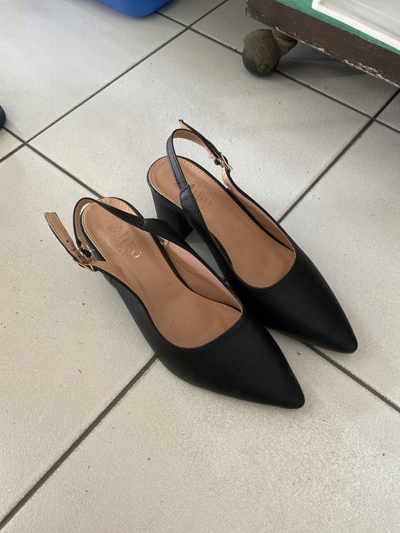 Black Pointed Toe Slingback Heels Size 38 (Category: Heels) located in Pasig City. Submitted by alaineeeee (Listing ID 1463982280, Image 1). Description: - Used only twice - Style: Black pointed toe slingback heels - Heel Type: Low block heel - Features: Adjustable ankle strap with buckle closure - Comfort: Comfortable for daily wear - Size: 38 - Condition: Minor scuffs on soles from normal wear.