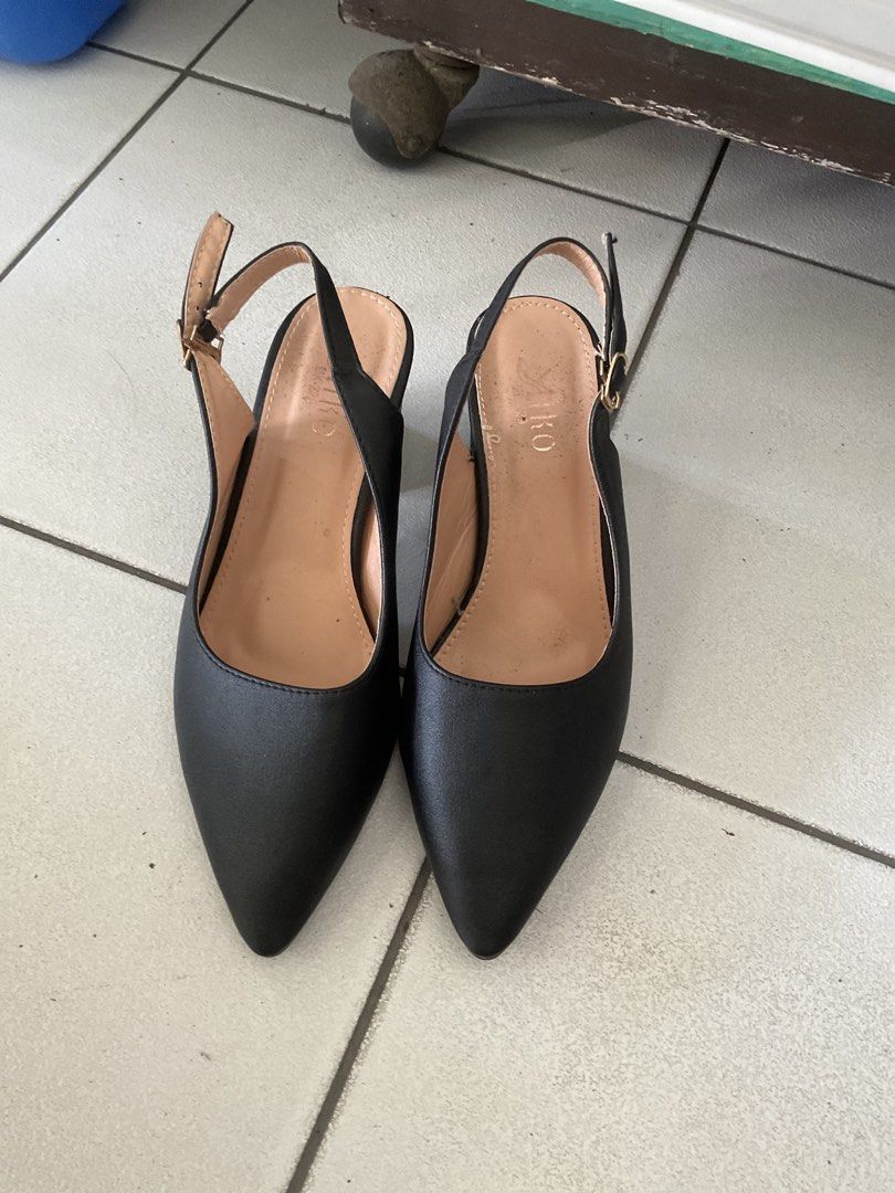 Black Pointed Toe Slingback Heels Size 38 (Category: Heels) located in Pasig City. Submitted by alaineeeee (Listing ID 1463982280, Image 2). Description: - Used only twice - Style: Black pointed toe slingback heels - Heel Type: Low block heel - Features: Adjustable ankle strap with buckle closure - Comfort: Comfortable for daily wear - Size: 38 - Condition: Minor scuffs on soles from normal wear.