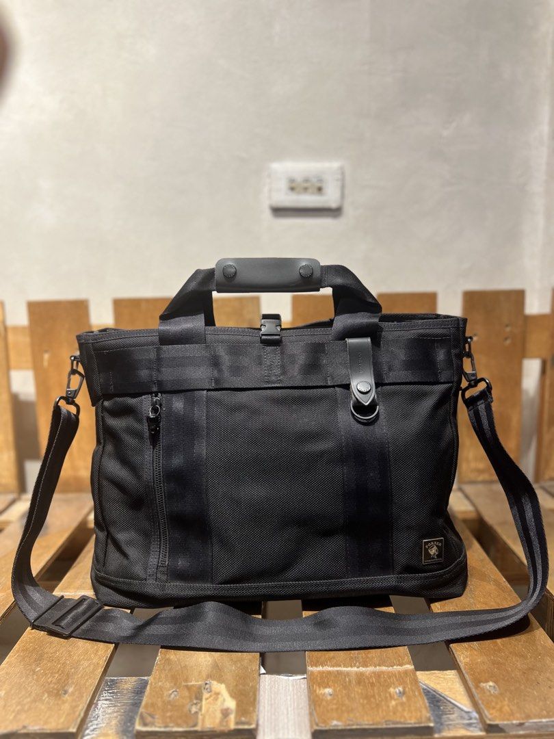 Black Porter Heat 2Way Tote Bag (Category: Sling Bags) located in Quezon City. Submitted by shanks. (Listing ID 1463940997, Image 1). Description: Black Porter Heat 2Way Tote Bag crafted from durable barrister nylon with a signature removable flashlight accessory on the front. Issue : missing maglite flash light Sign of wear in good condition .
