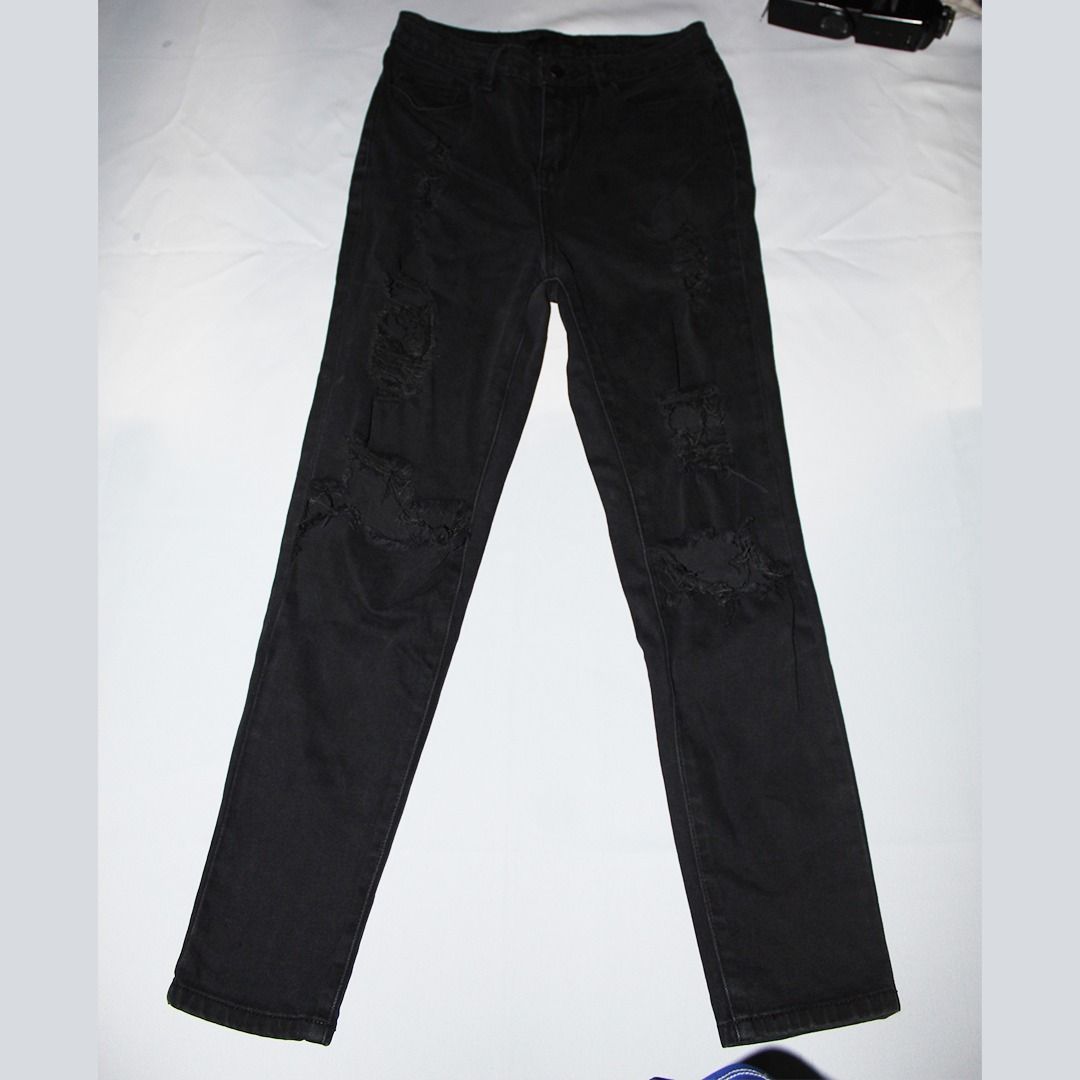 Black Ripped Jeans (Category: Jeans) located in Tanauan. Submitted by arlene_panganiban (Listing ID 1463998556, Image 2). Description: - 26 waist line - Slightly torn from the ripped - High-waisted black denim jeans - Ripped details on knees and thighs - Straight leg fit - Versatile for casual looks - Easy to pair with any top.