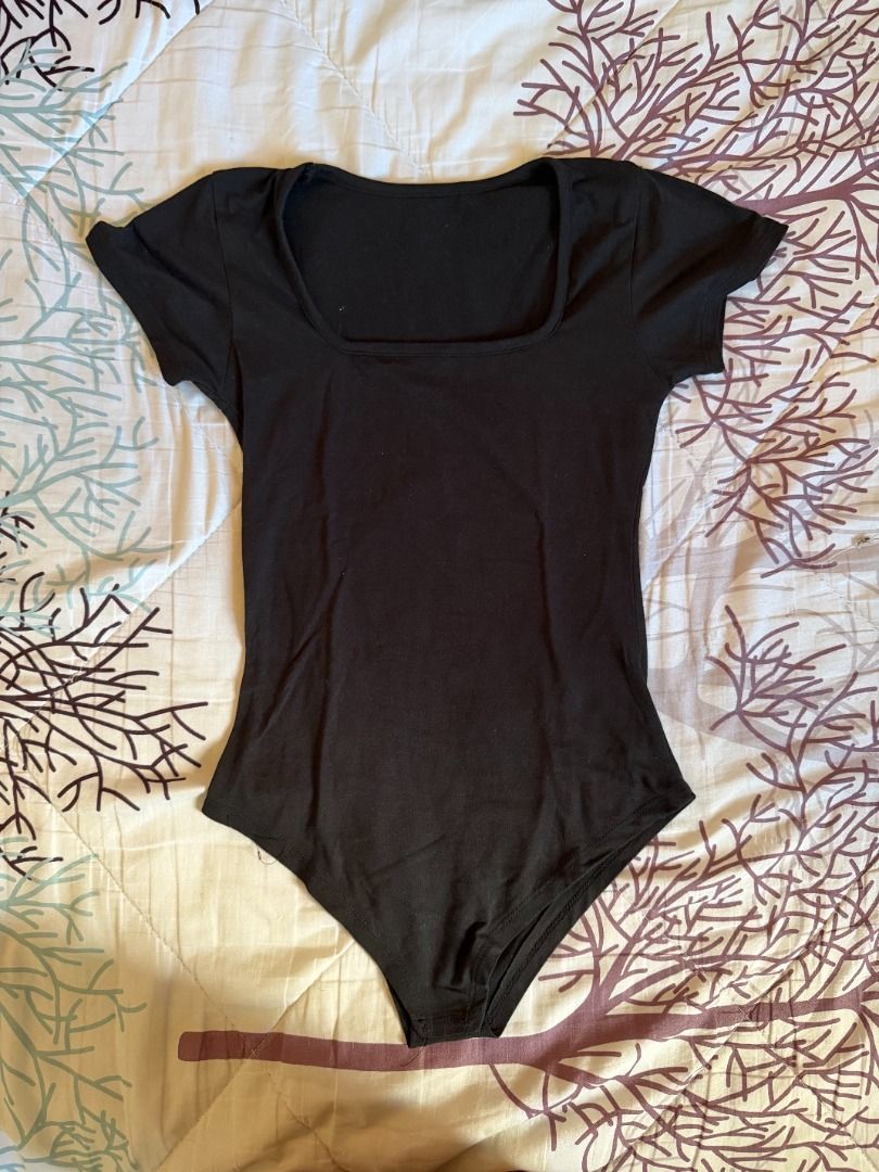Black Square Neck Short Sleeve Bodysuit (Category: Blouses) located in Manila. Submitted by dndclothing (Listing ID 1463979037, Image 1). Description: ⊹ basic black short-sleeve bodysuit ⊹ free size but best fits S-M imo ⊹ made with stretchy material for a comfortable fit ⊹ effortlessly pairs with jeans, skirts, or shorts a must-have wardrobe staple.