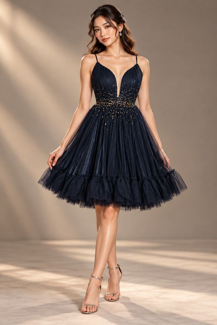 Black Tulle Beaded Party Dress (Category: Dresses) located in Cabuyao City. Submitted by 2d8764ba06fae61bbbd0dbb5af913b (Listing ID 1449977867, Image 1). Description: - fits medium to large - Short black party dress - Sweetheart neckline with thin straps - Bodice embellished with gold beads - Tulle overlay with a ruffled hem - Ideal for parties and special events.