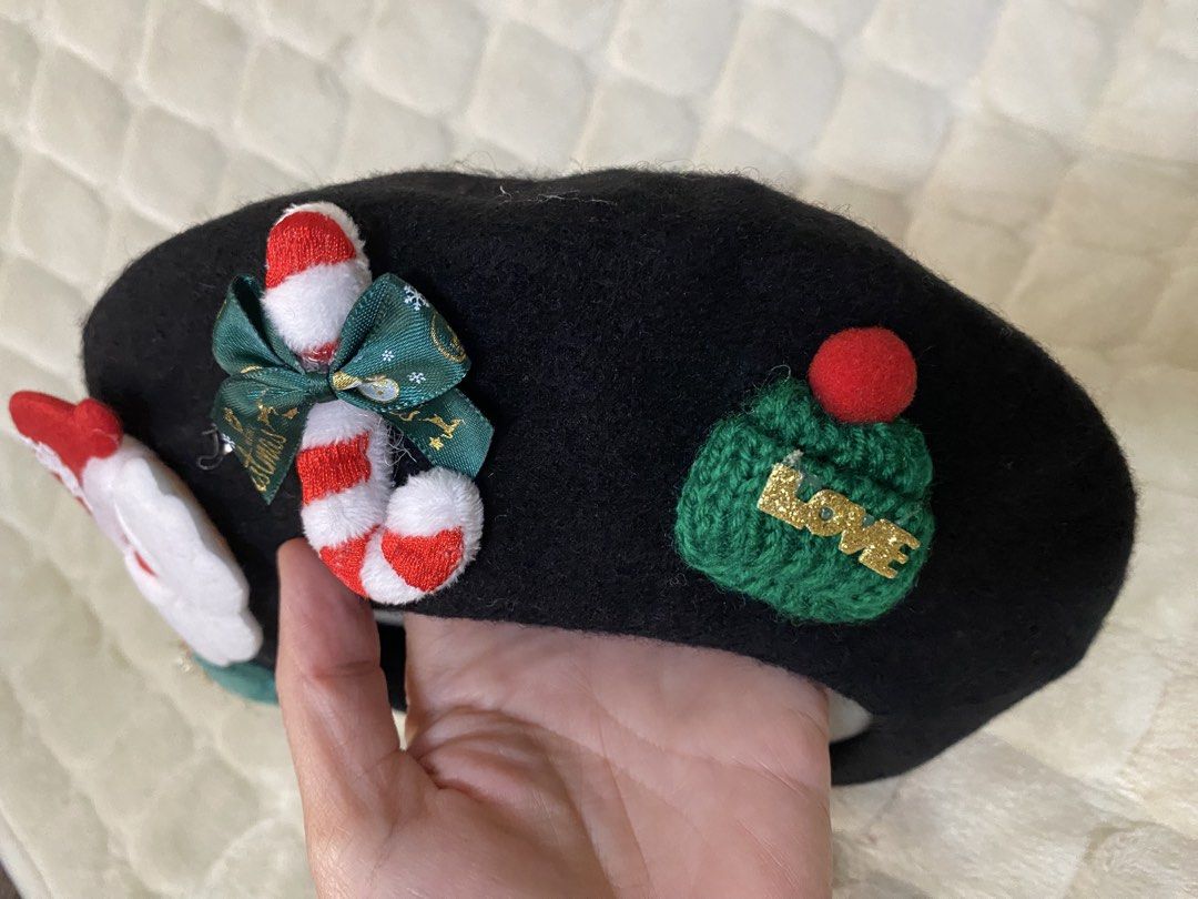 Black Wo Beret with Christmas Decorations (Category: Coats, Jackets and Outerwear) located in Baguio. Submitted by SweetRepeat (Listing ID 1463956022, Image 2). Description: - Cute black beret - Festive Christmas patches: Santa, candy cane, Christmas tree - Great for holiday parties - Adds fun to any outfit - One size fits most - Perfect for the holiday season!.
